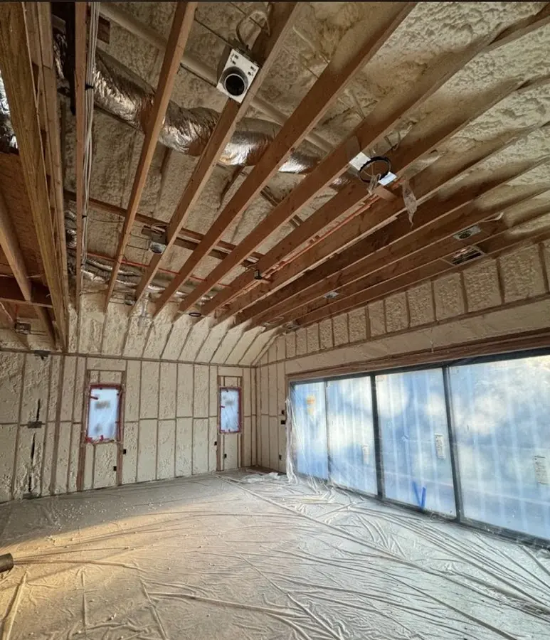 Interior walls and ceiling insulated with spray foam during new construction in Riverside